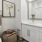 a bathroom with a mirror and a sink