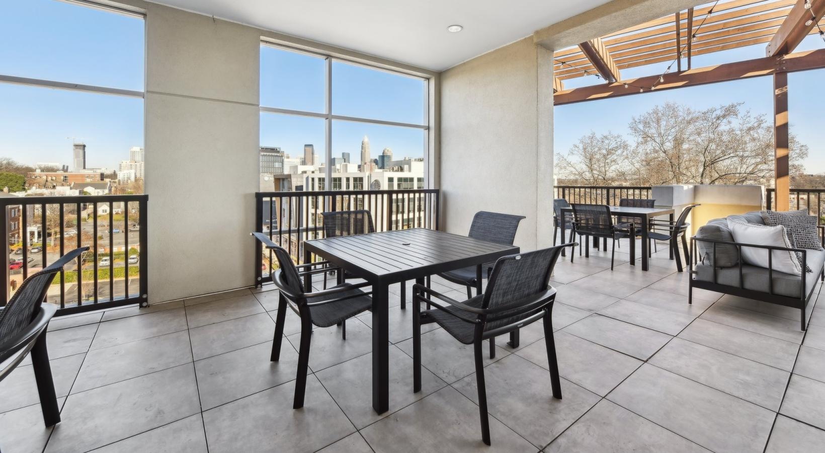 Find your perfect fit at Lincoln at Dilworth a room with a table and chairs