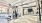 a gym with exercise equipment and tv