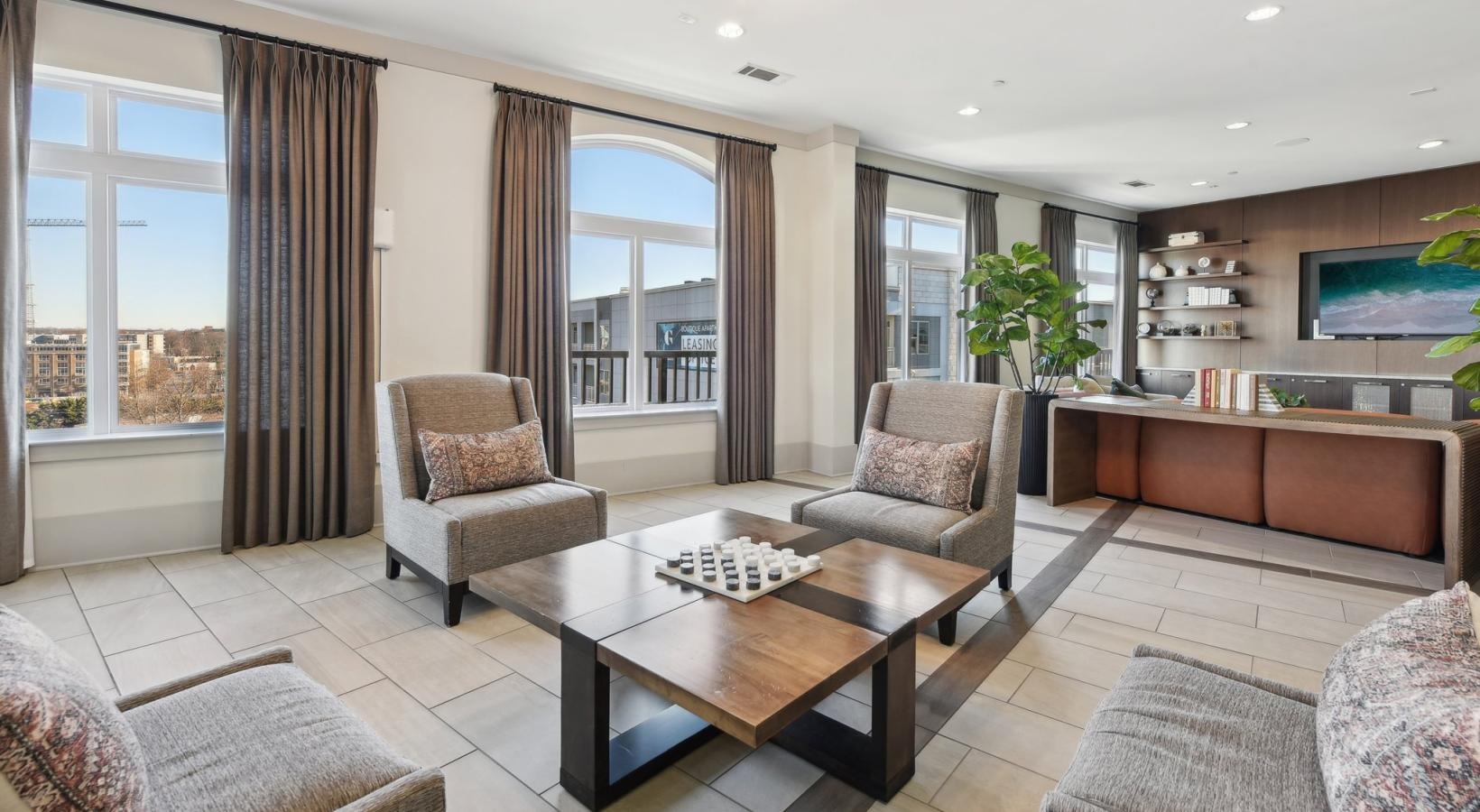 Find your perfect fit at Lincoln at Dilworth a living room with a large glass door