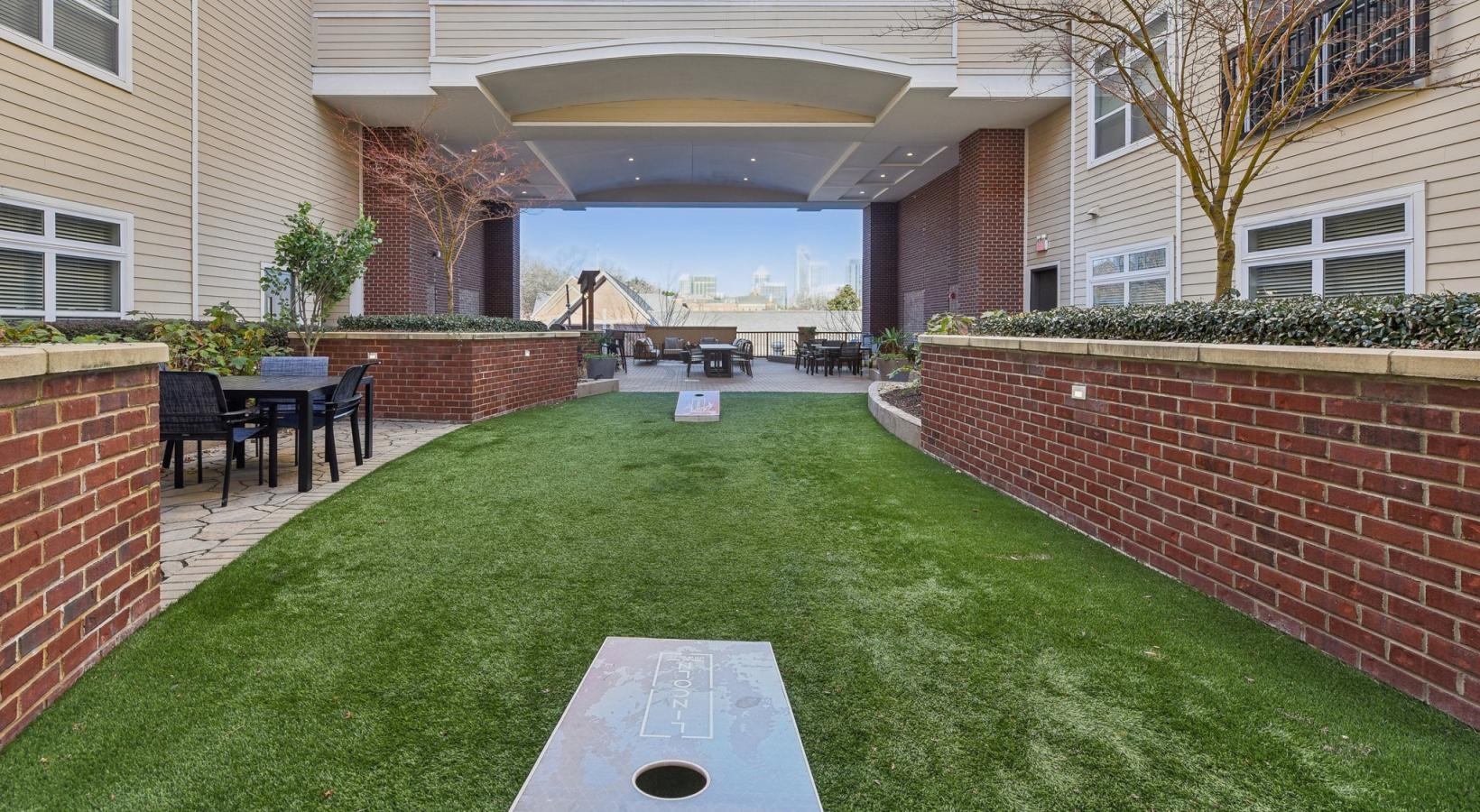 Find your perfect fit at Lincoln at Dilworth a brick building with a brick patio