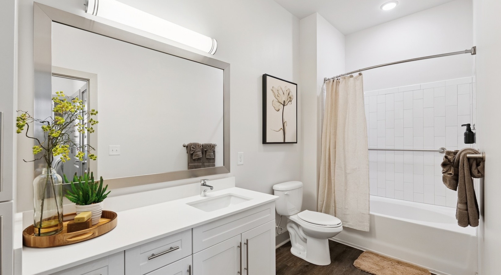 Spacious bathrooms with everything you need well lit bathroom